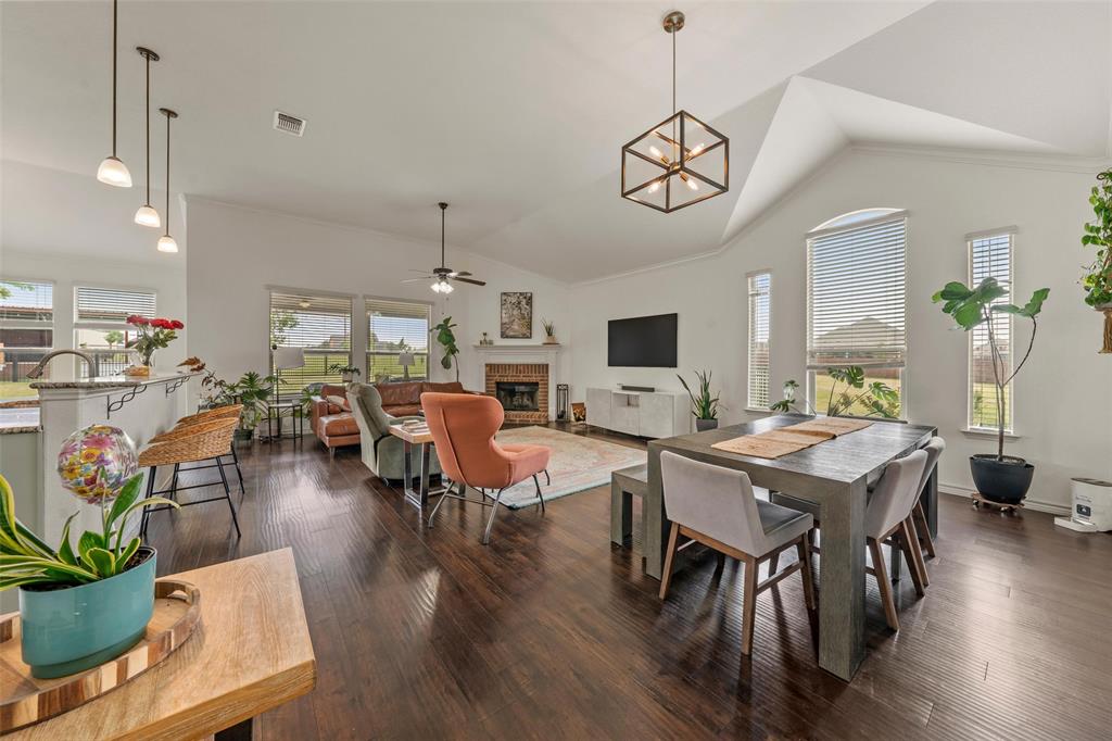 4756 Old Lorena Road Lorena, TX 76655 - Photo 5 of 39 a view of a dining room with furniture window and wooden floor
