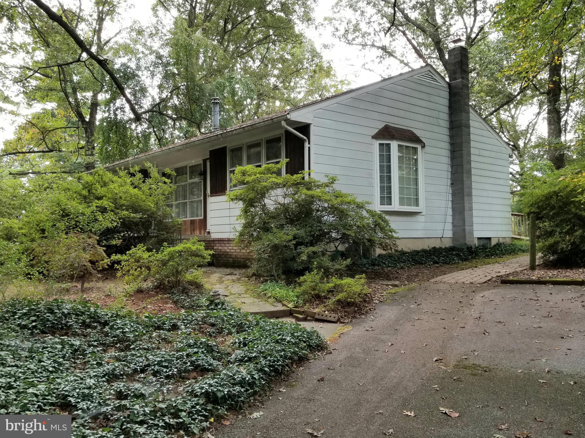 2548 Roop Road Keymar, MD 21757 - Photo 3 of 33 a view of a house with a yard and potted plants