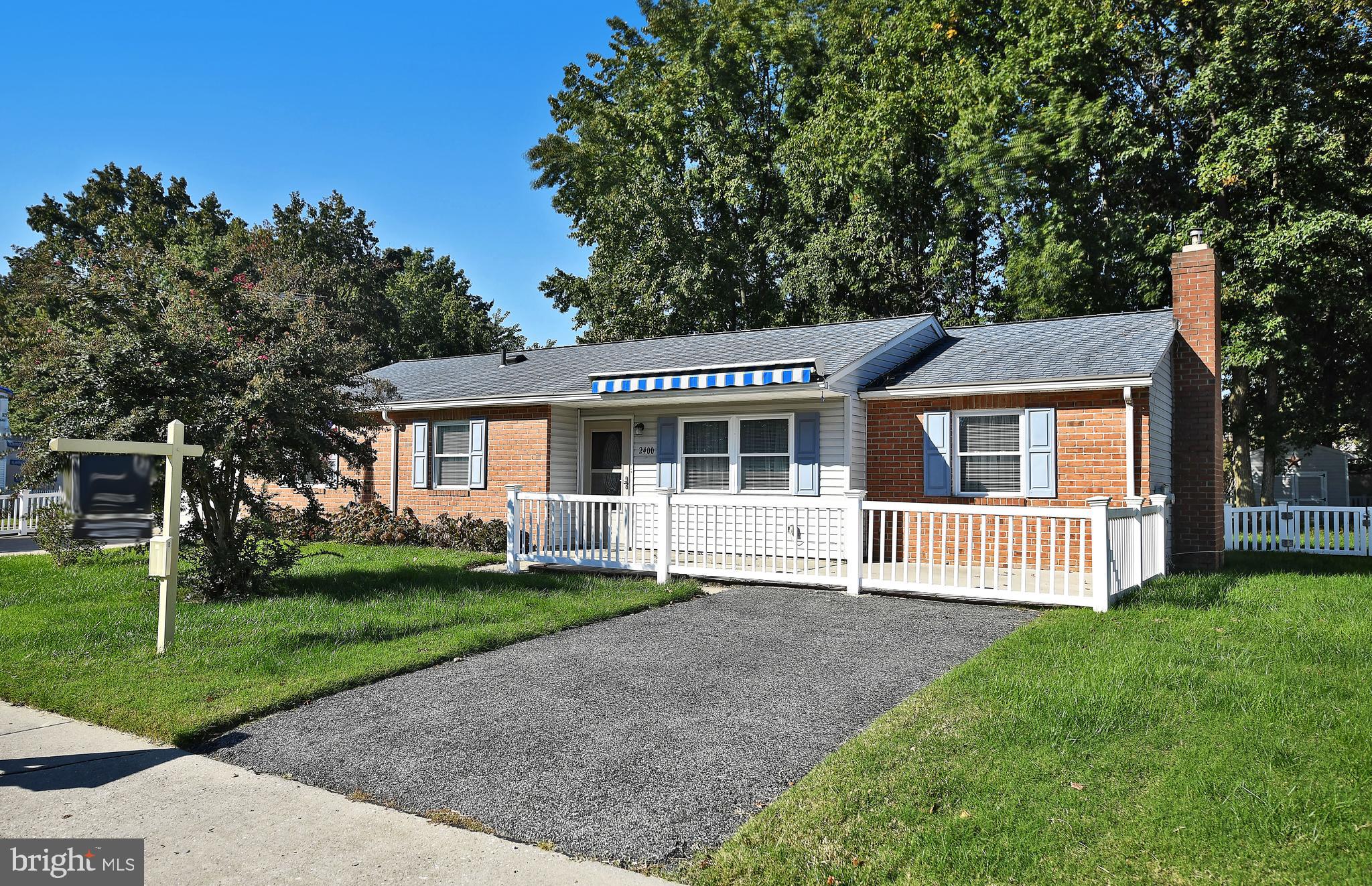 2400 Maple Road Baltimore, MD 21219 - Photo 1 of 45 front view of a house and a yard