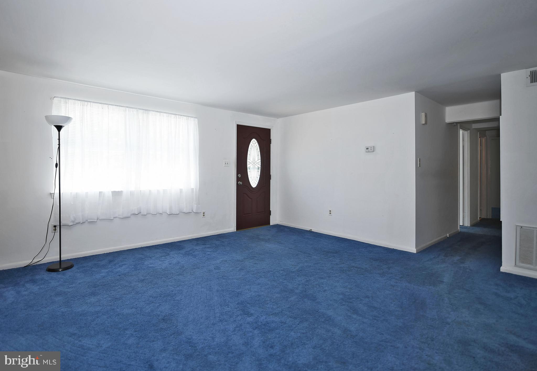 2400 Maple Road Baltimore, MD 21219 - Photo 17 of 45 an empty room with windows