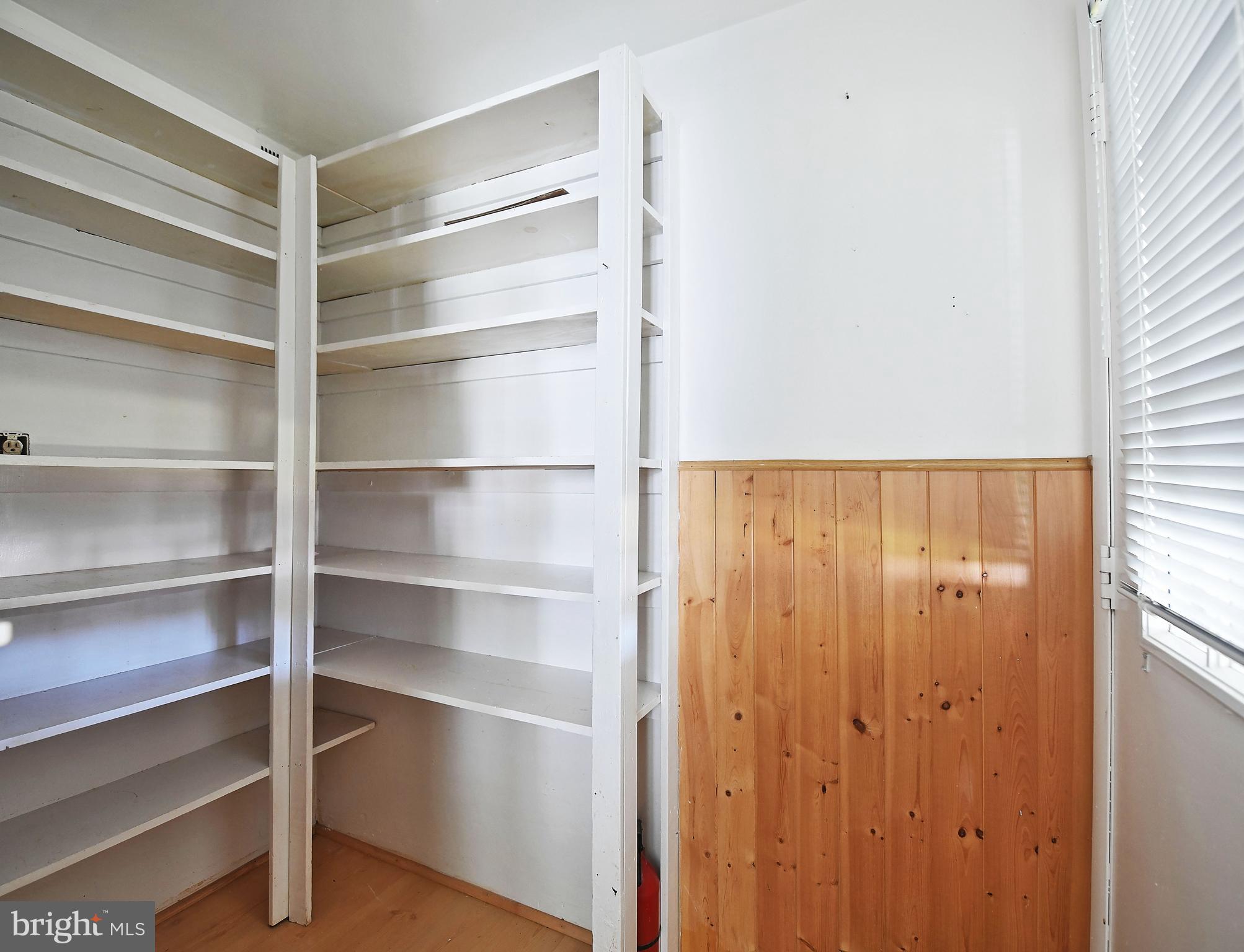 2400 Maple Road Baltimore, MD 21219 - Photo 27 of 45 a view of a room with rack on the wall