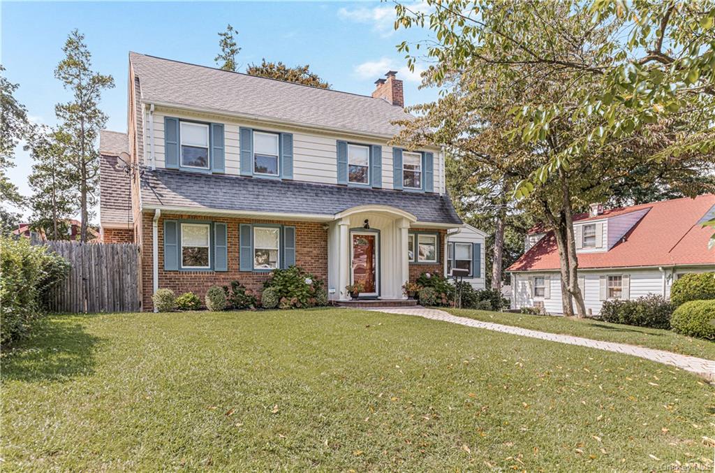 10 Glenwood Avenue New Rochelle, NY 10801 - Photo 1 of 29 a front view of a house with a yard