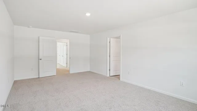 a bathroom with 2 sink and a mirror