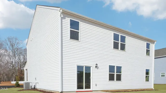 a view of a house with yard