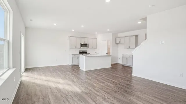 a view of kitchen with wooden floor