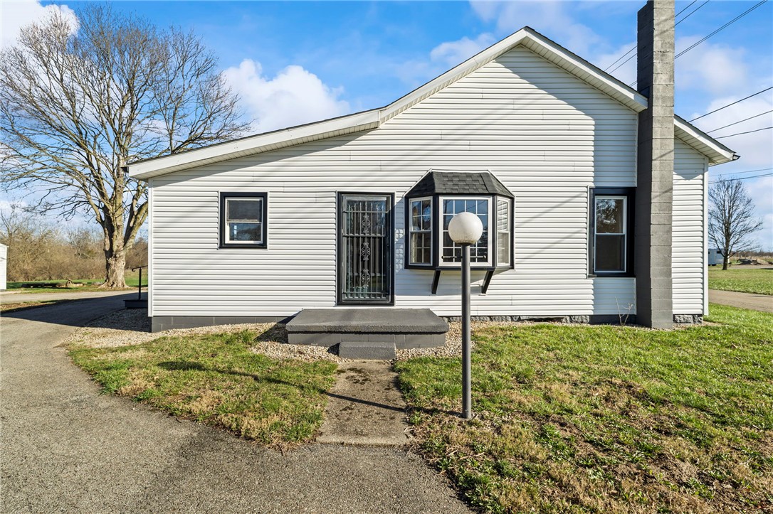 10797 Gratis Jacksonburg Road Somerville, OH 45064 - Photo 27 of 27 This charming home offers a bright exterior with classic architectural details and inviting curb appeal.