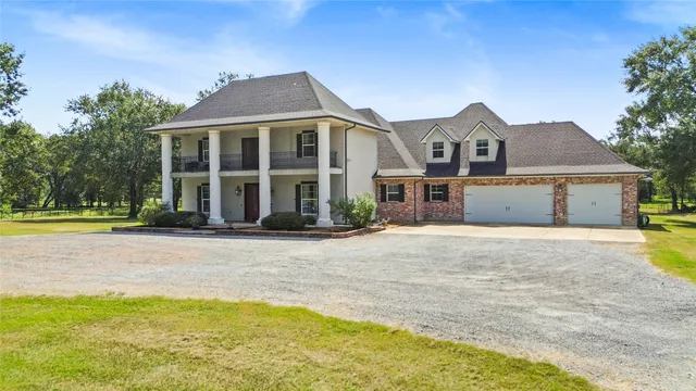 a front view of a house with a swimming pool