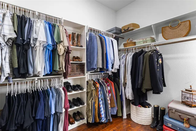 a kitchen with a stove a sink and a refrigerator