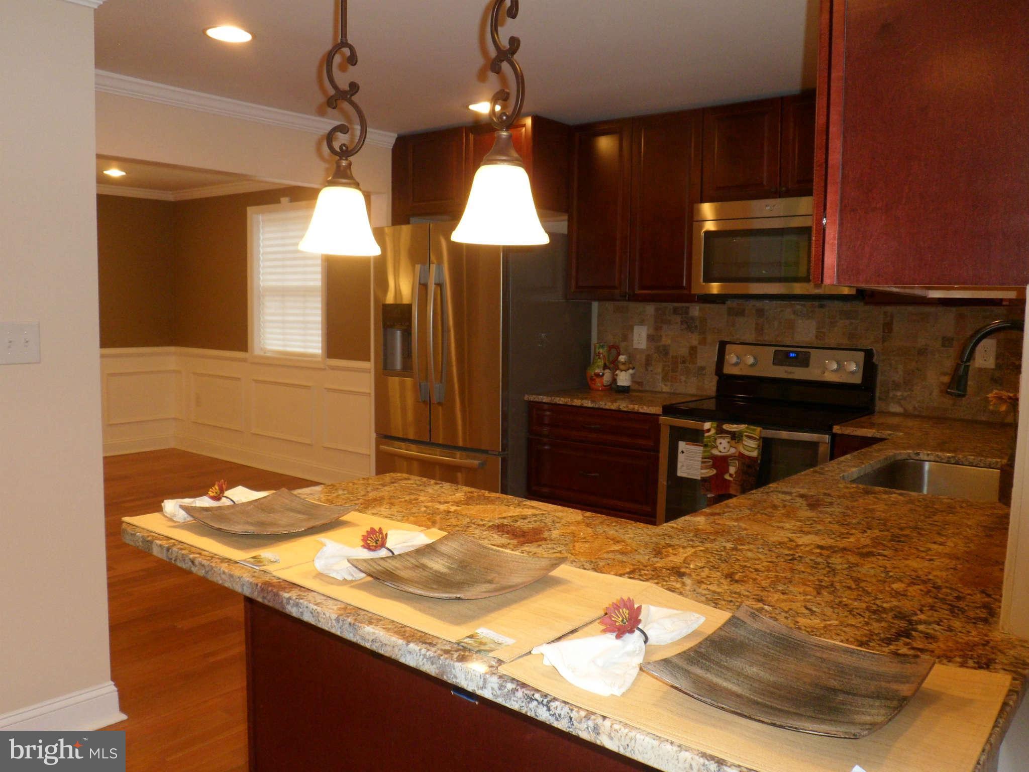 8415 Brock Bridge Road Laurel, MD 20724 - Photo 4 of 30 Breakfast Bar Open To Living Room