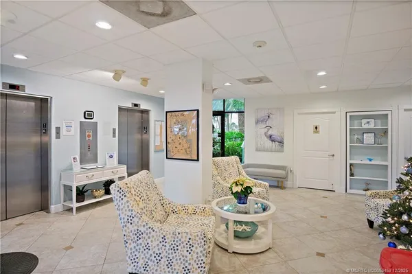 a living room with furniture and window