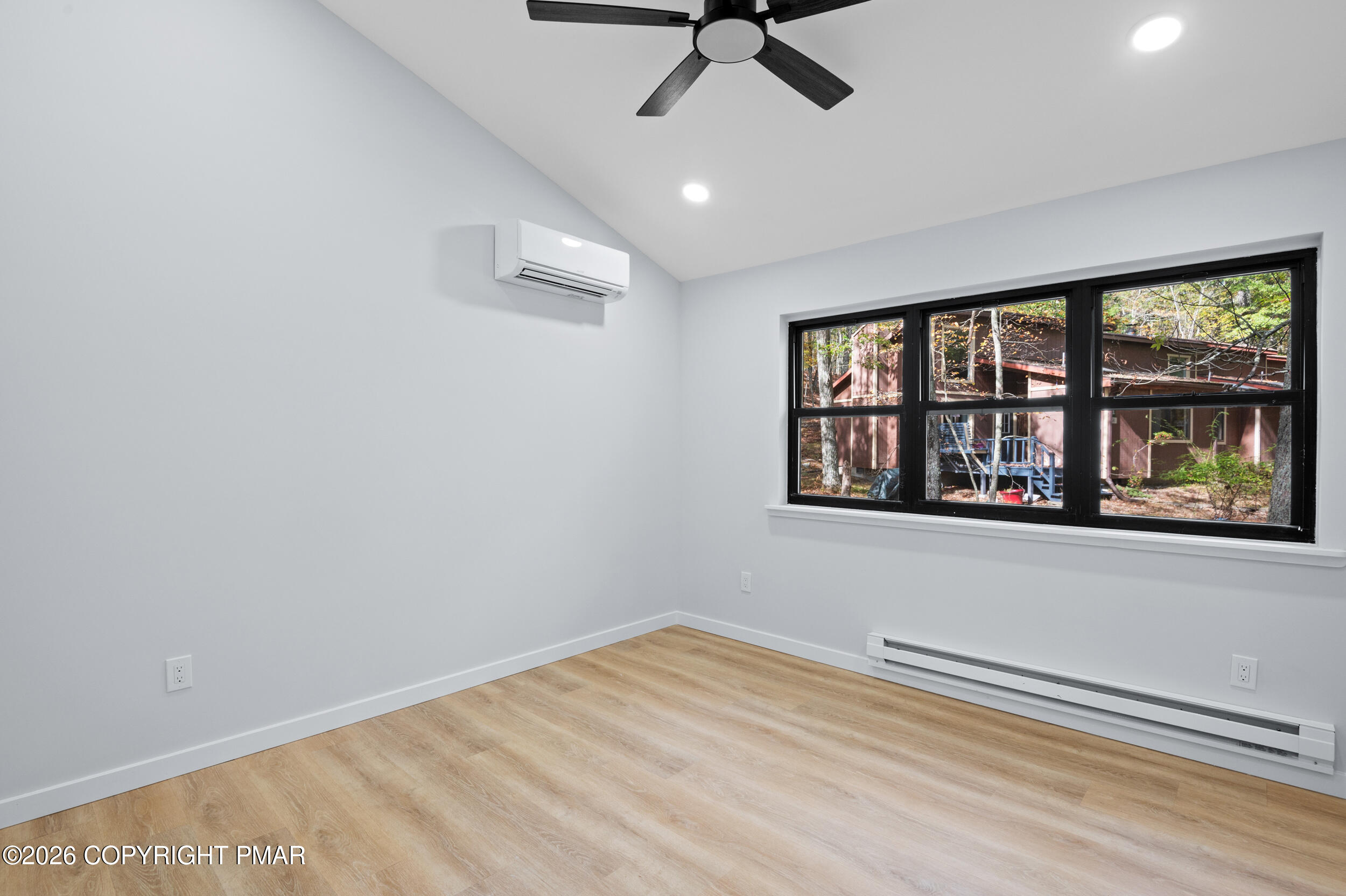 120 Twin Rivers Road, Unit B Lackawaxen, PA 18435 - Photo 13 of 29 a view of an empty room with a window