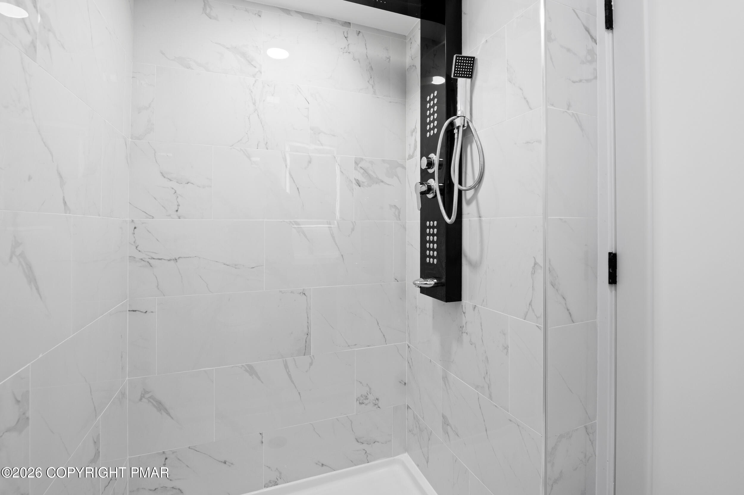 120 Twin Rivers Road, Unit B Lackawaxen, PA 18435 - Photo 22 of 29 a bathroom with a shower