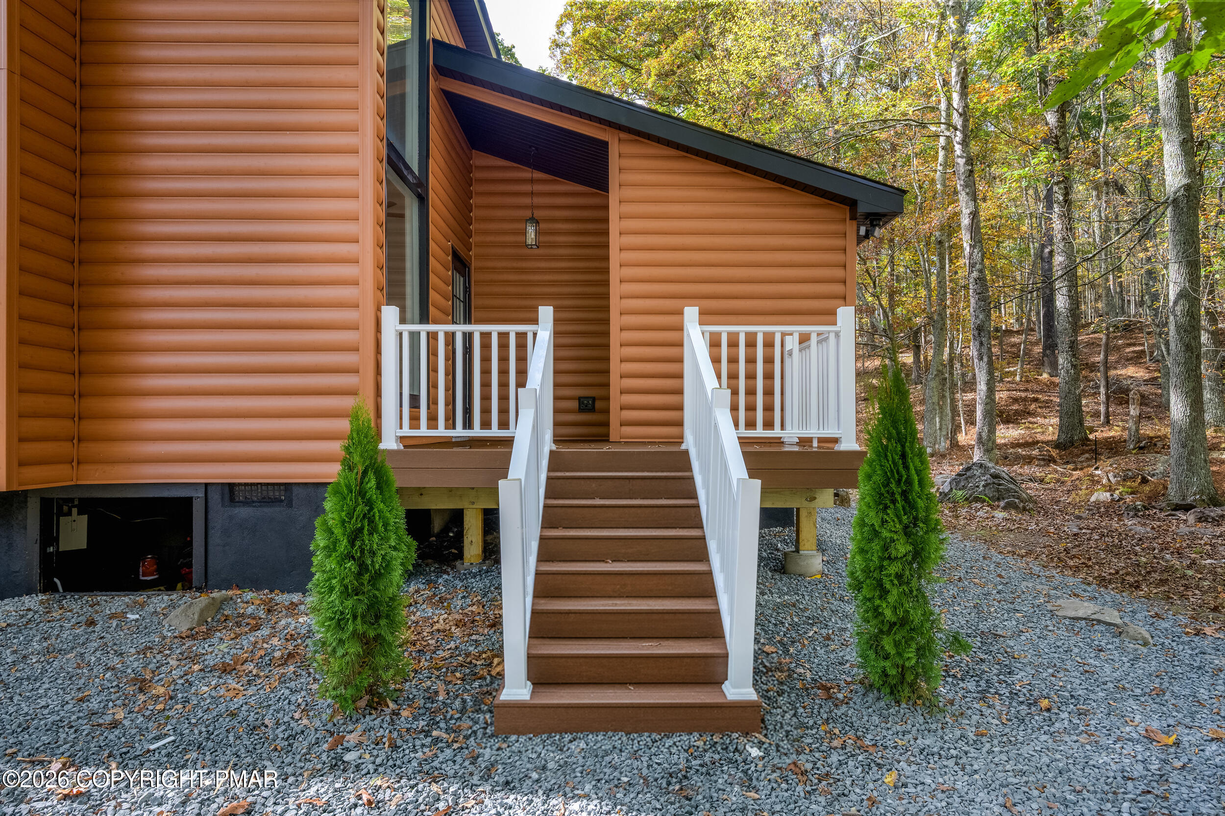 120 Twin Rivers Road, Unit B Lackawaxen, PA 18435 - Photo 3 of 29 a front view of a house with a yard