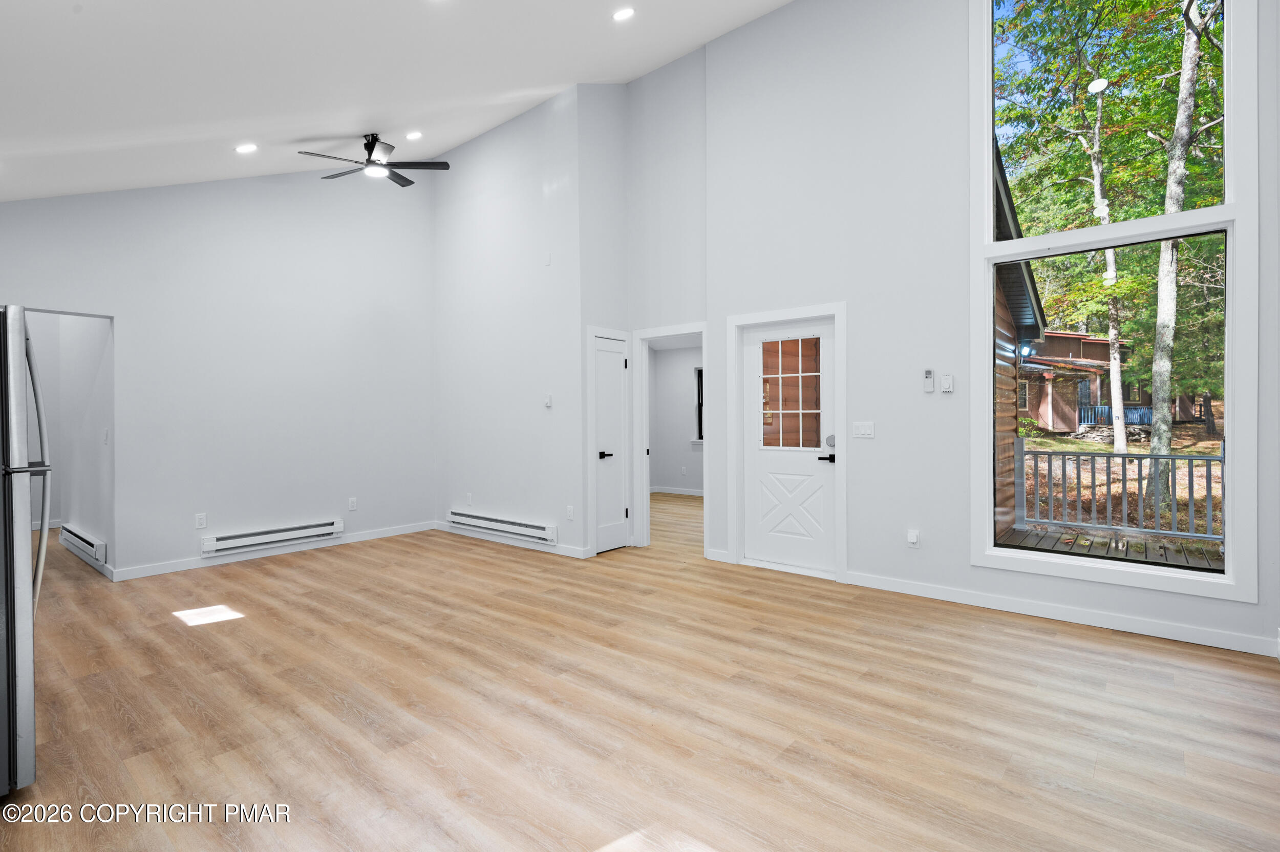 120 Twin Rivers Road, Unit B Lackawaxen, PA 18435 - Photo 7 of 29 a view of an empty room with a window