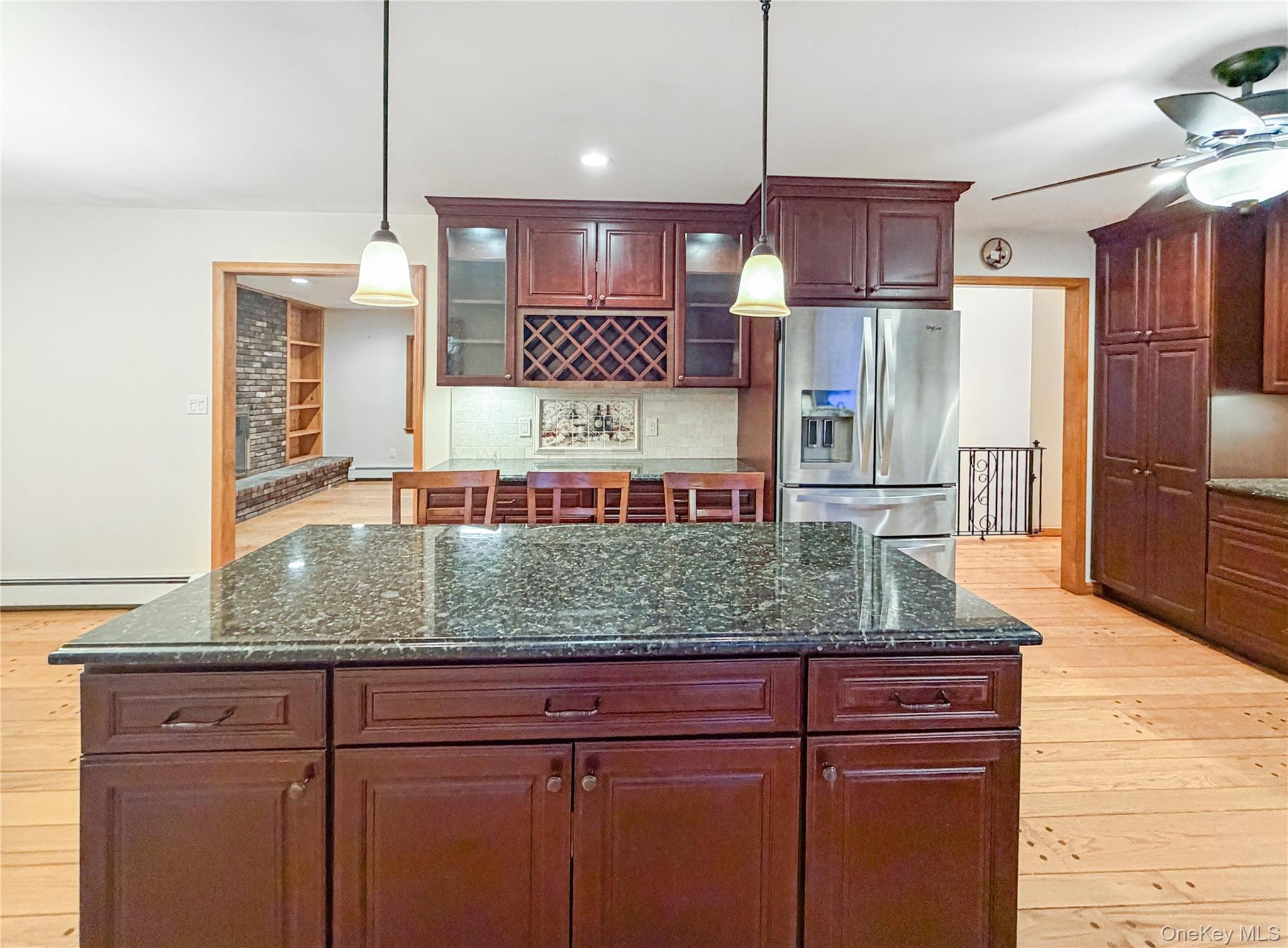 25 East Mountain Road South Cold Spring, NY 10516 - Photo 11 of 48 a kitchen with stainless steel appliances granite countertop a sink refrigerator and microwave