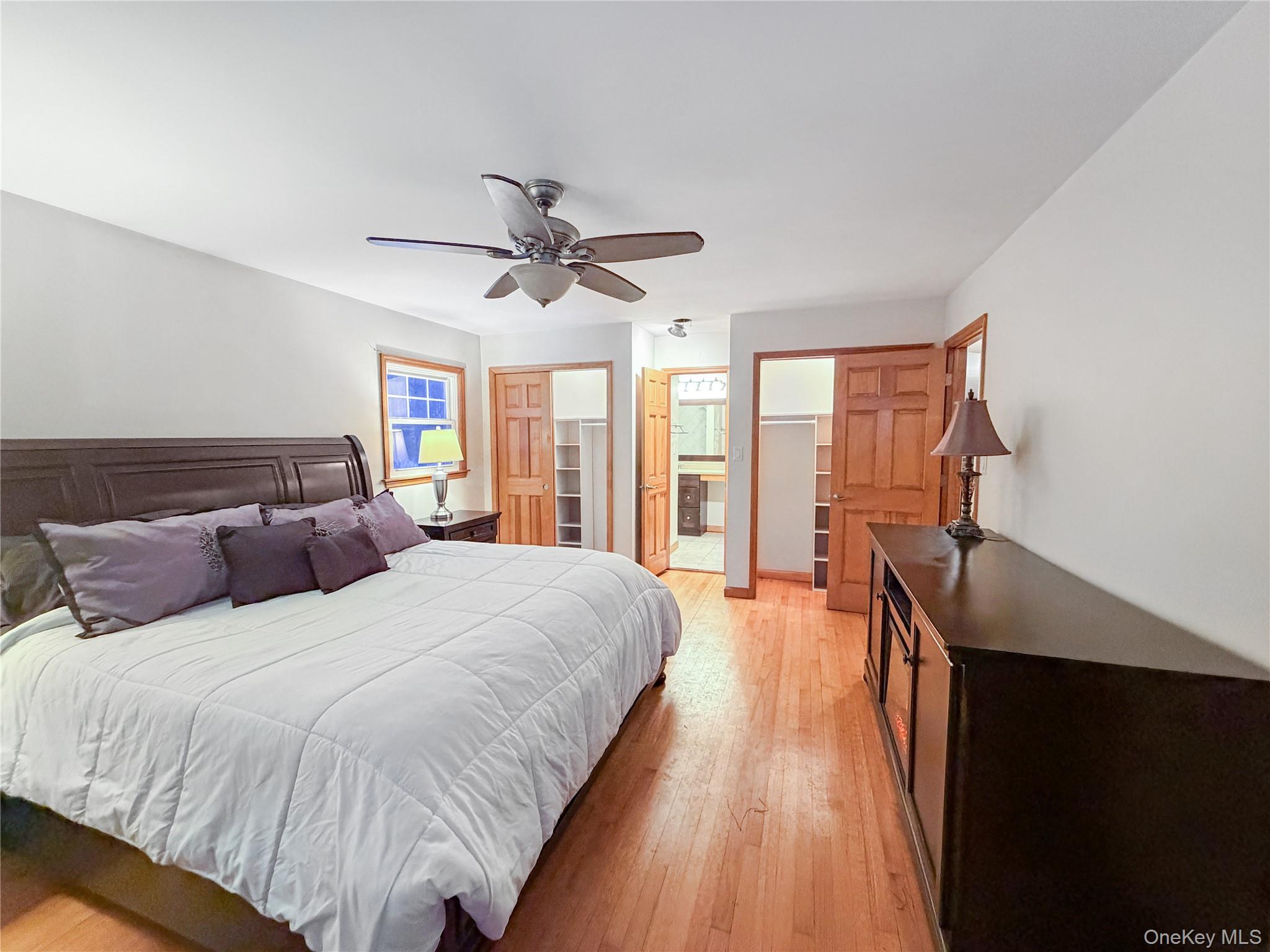 25 East Mountain Road South Cold Spring, NY 10516 - Photo 17 of 48 a bedroom with double bed and a large window