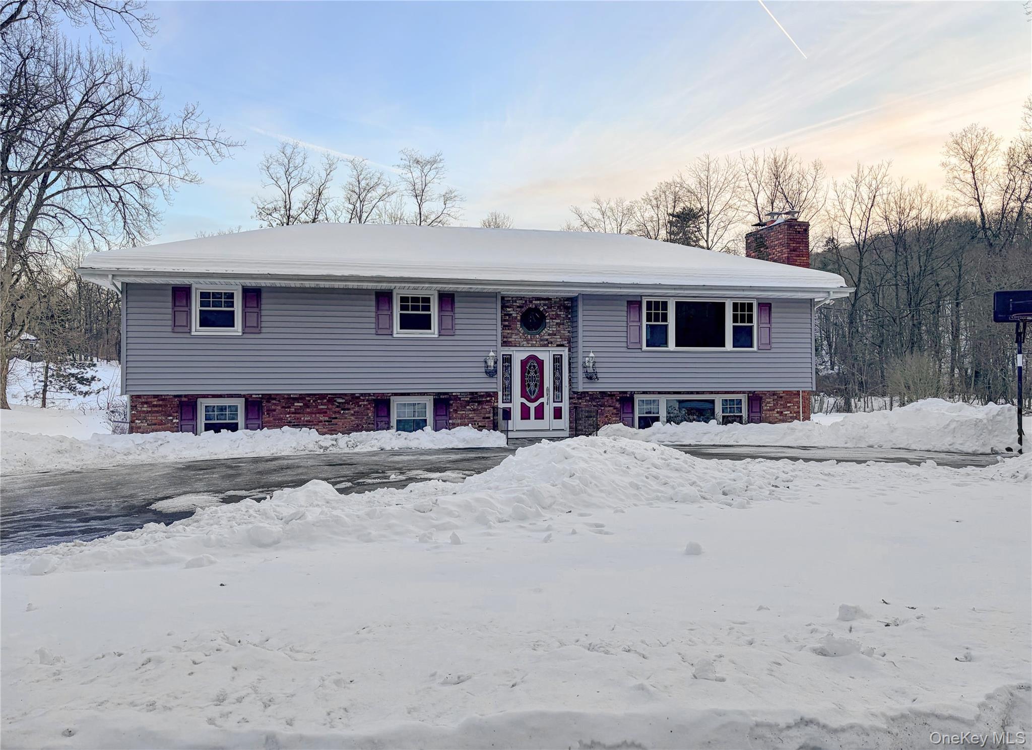25 East Mountain Road South Cold Spring, NY 10516 - Photo 2 of 48 a view of a backyard of a house