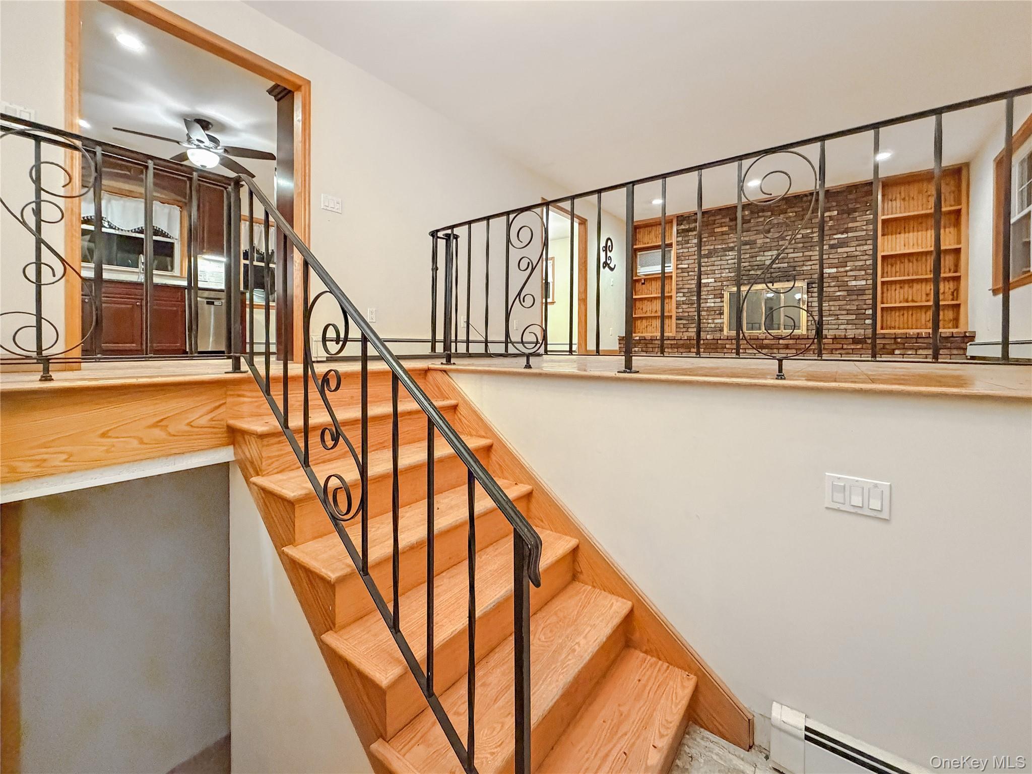 25 East Mountain Road South Cold Spring, NY 10516 - Photo 3 of 48 a view of staircase with railing and a large window