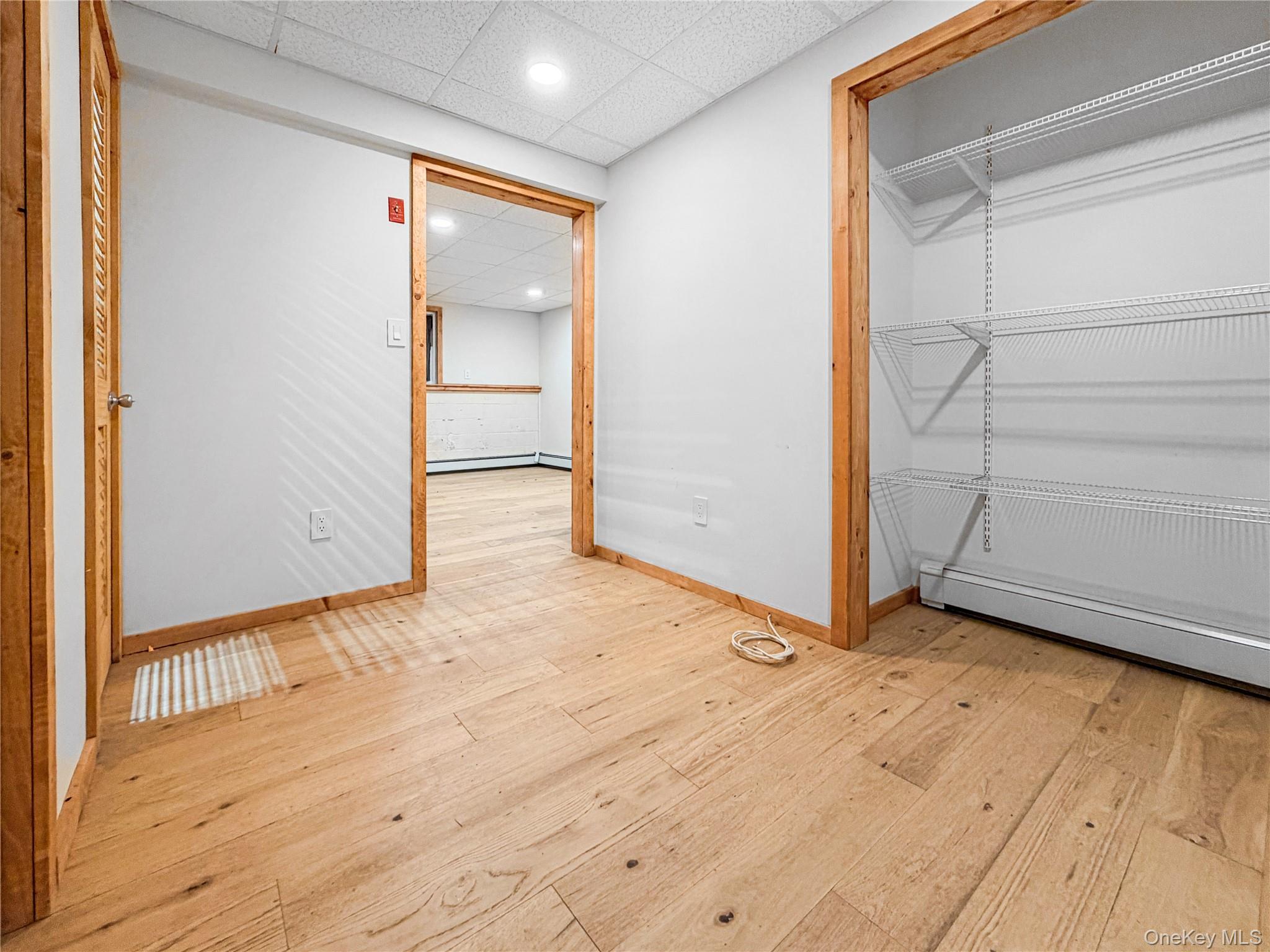 25 East Mountain Road South Cold Spring, NY 10516 - Photo 31 of 48 a view of an empty room with wooden floor and a window