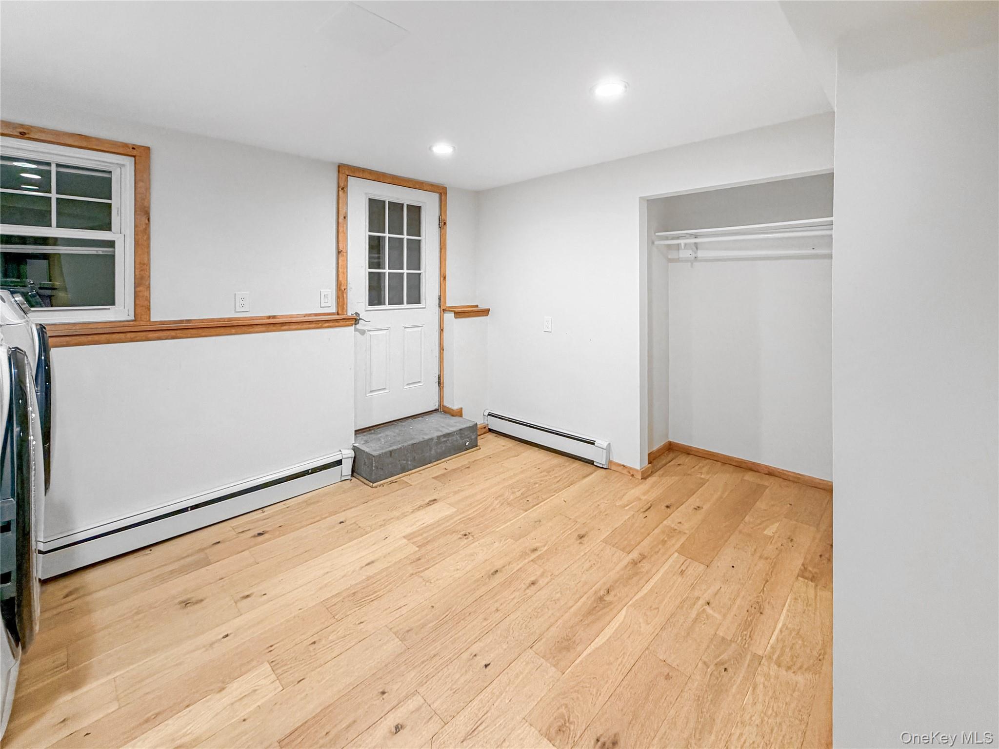 25 East Mountain Road South Cold Spring, NY 10516 - Photo 33 of 48 an empty room with wooden floor and windows