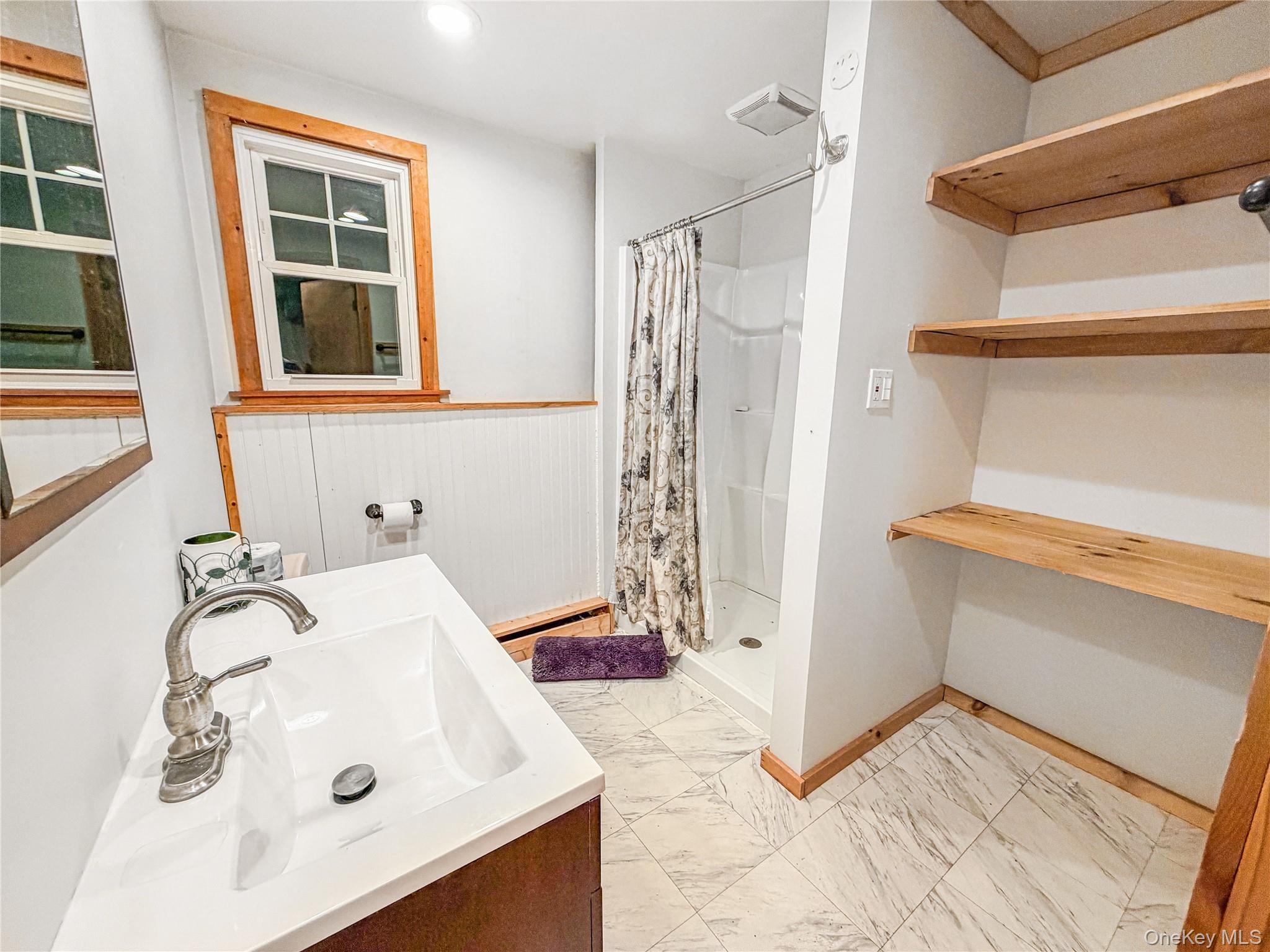 25 East Mountain Road South Cold Spring, NY 10516 - Photo 36 of 48 a bathroom with a sink and a tub