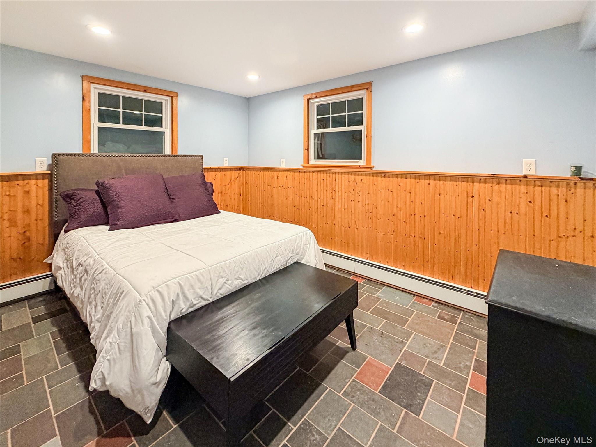 25 East Mountain Road South Cold Spring, NY 10516 - Photo 38 of 48 a bed sitting in a room next to a window