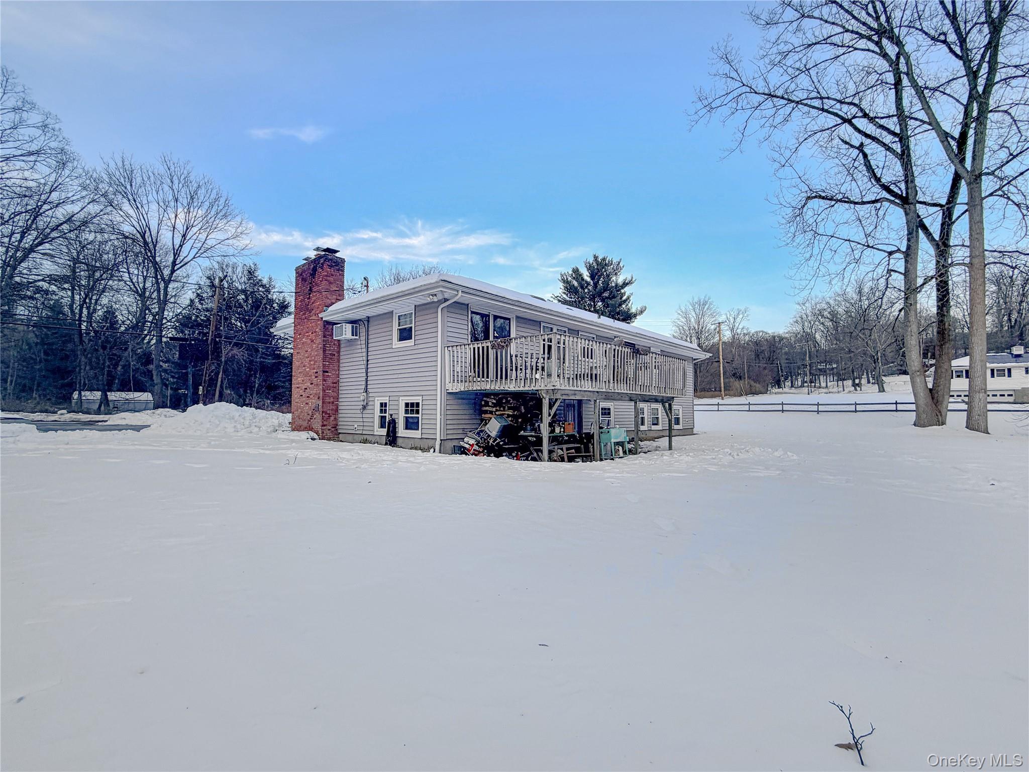 25 East Mountain Road South Cold Spring, NY 10516 - Photo 47 of 48 a view of a house with a snow in the yard