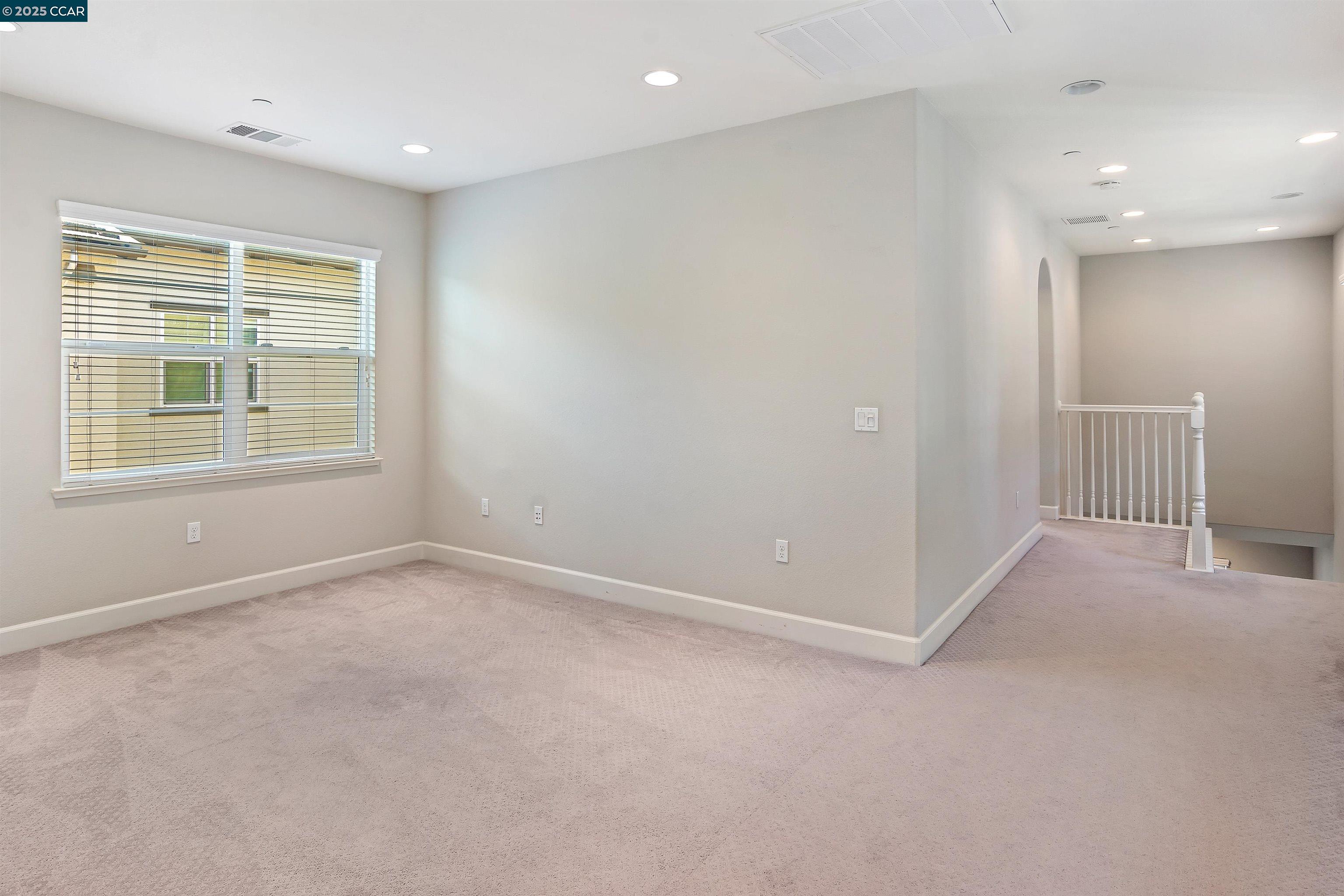4969 Ivy Leaf Springs Road San Ramon, CA 94582 - Photo 15 of 34 an empty room with windows