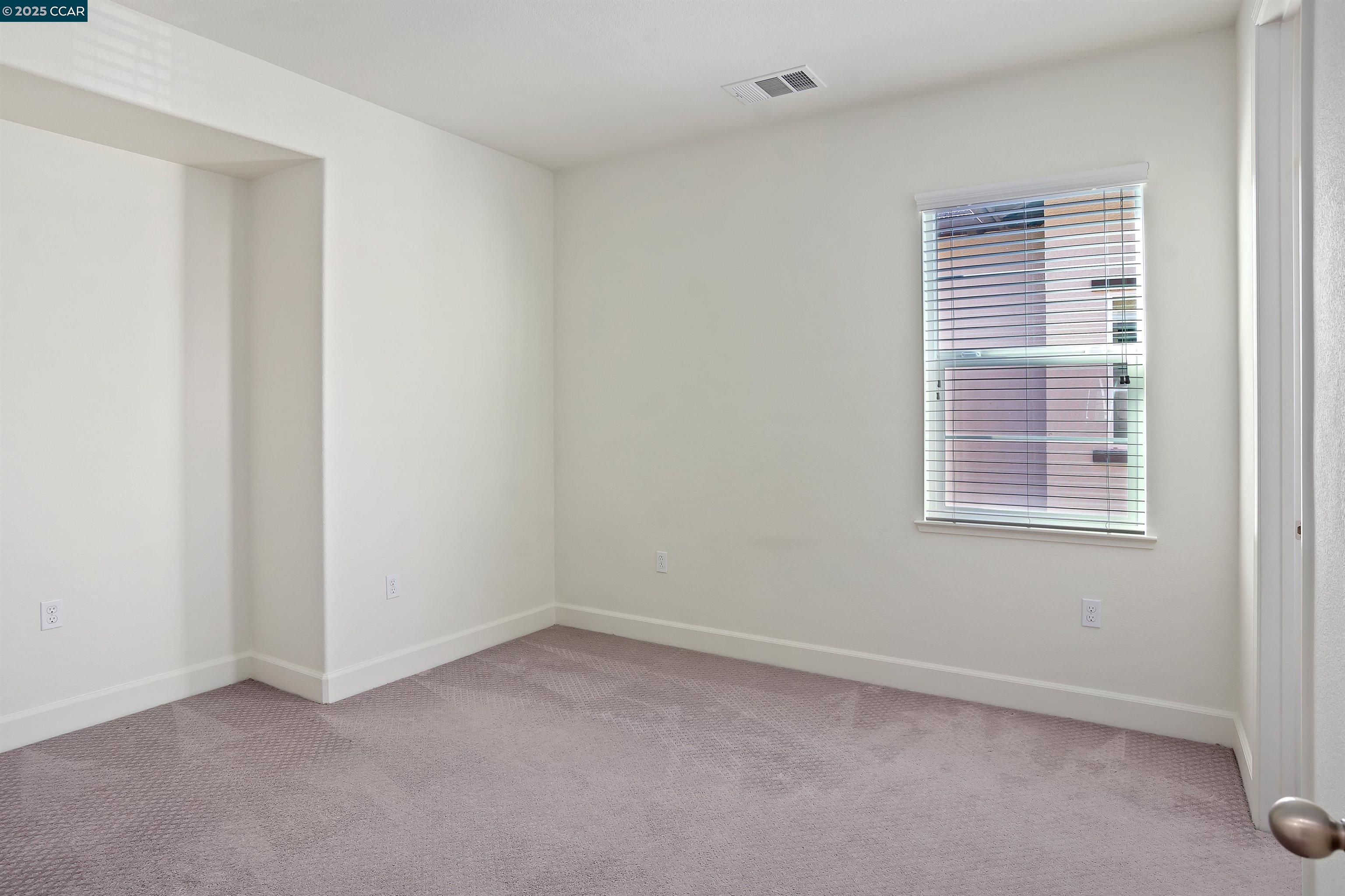 4969 Ivy Leaf Springs Road San Ramon, CA 94582 - Photo 27 of 34 an empty room with a window