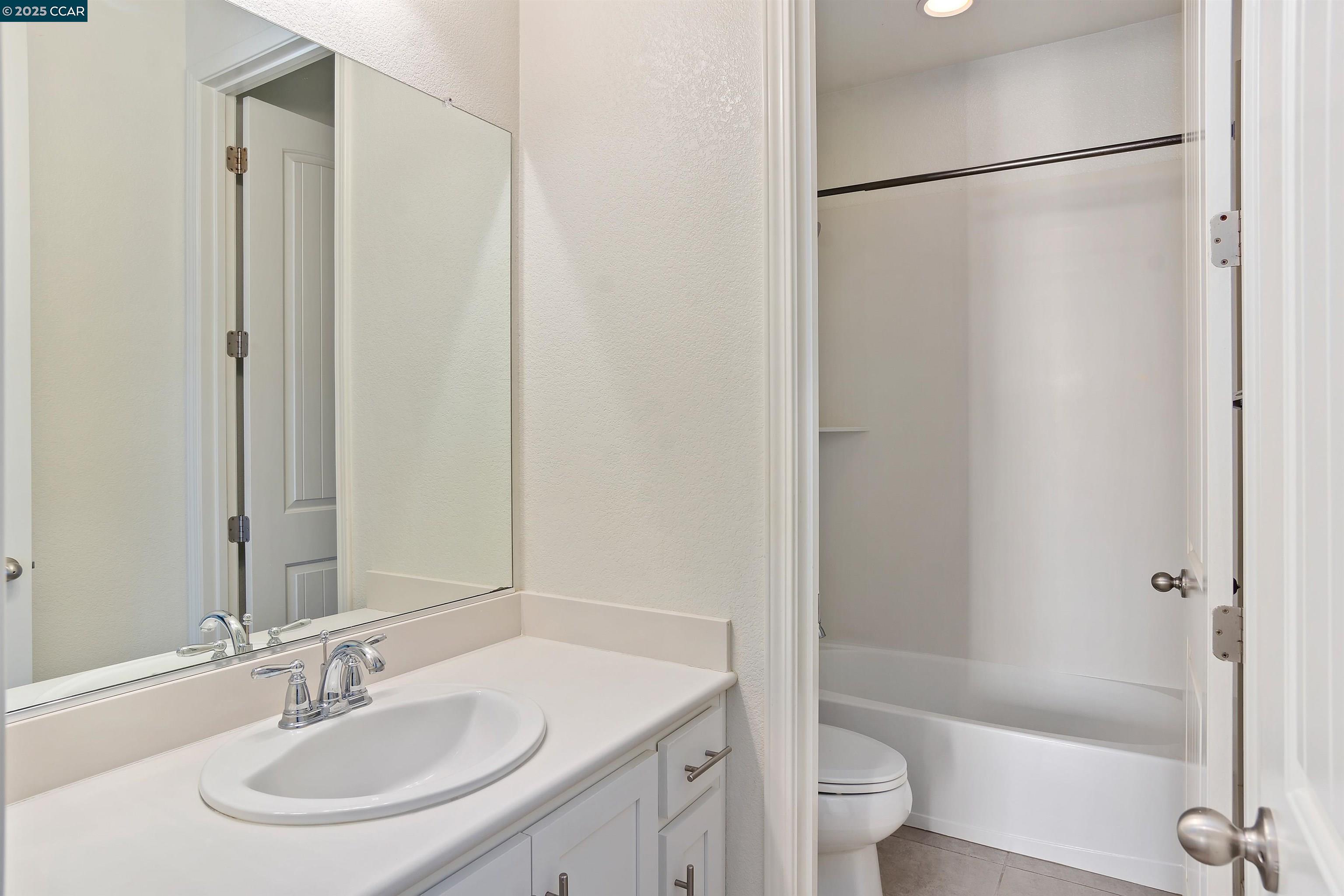4969 Ivy Leaf Springs Road San Ramon, CA 94582 - Photo 29 of 34 a bathroom with a sink toilet and shower