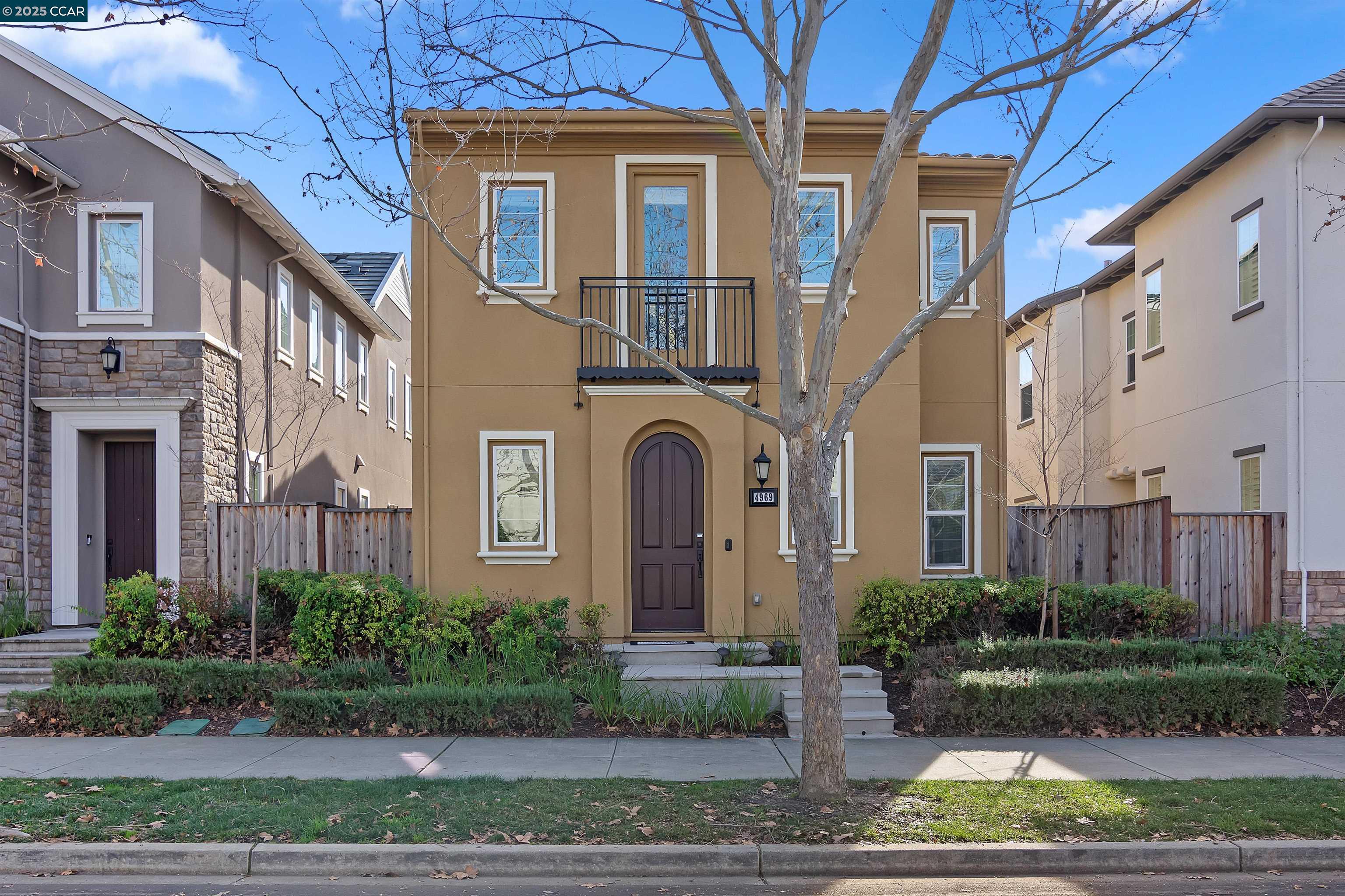 4969 Ivy Leaf Springs Road San Ramon, CA 94582 - Photo 3 of 34 a front view of a residential houses with yard