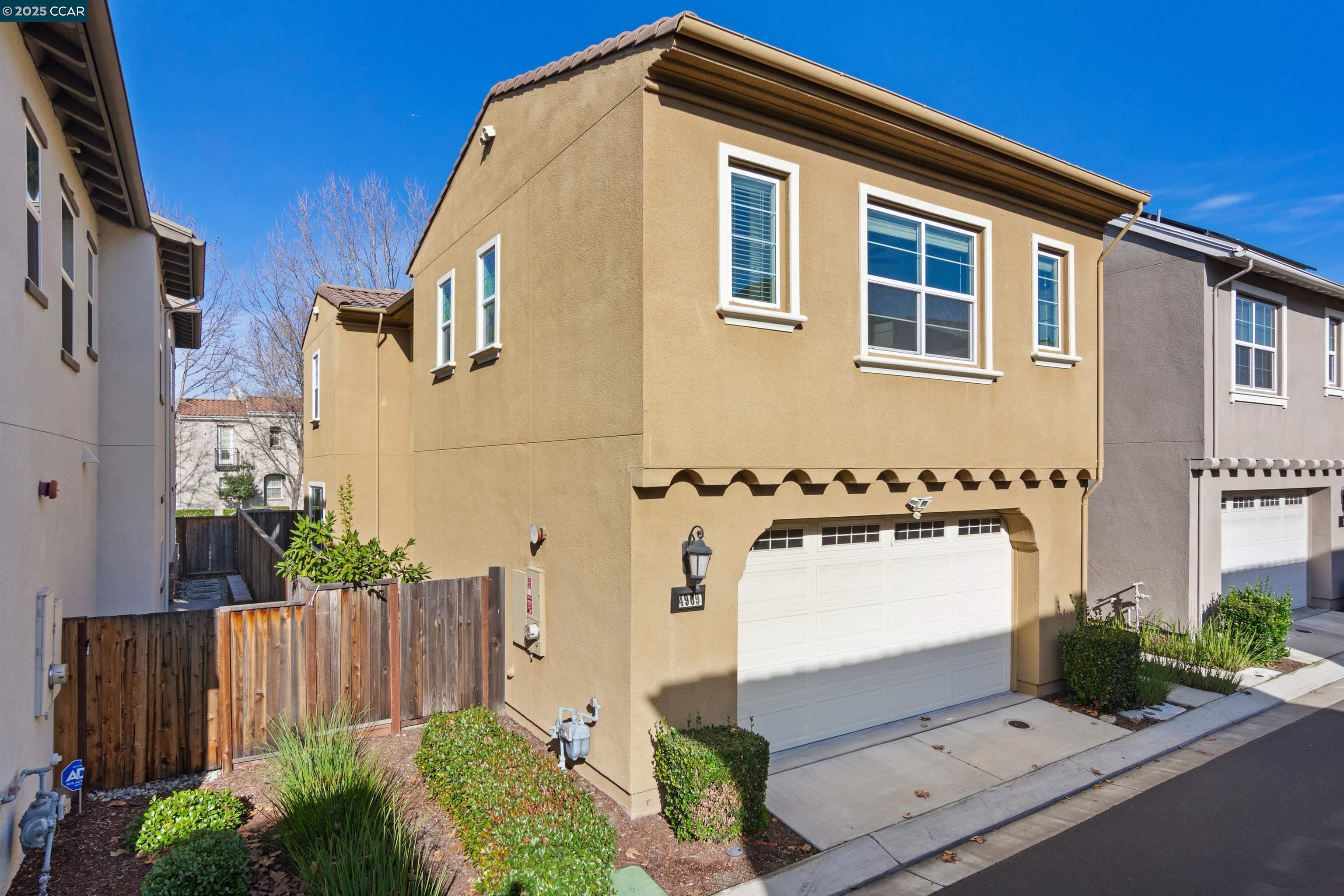 4969 Ivy Leaf Springs Road San Ramon, CA 94582 - Photo 33 of 34 a front view of a house with a yard