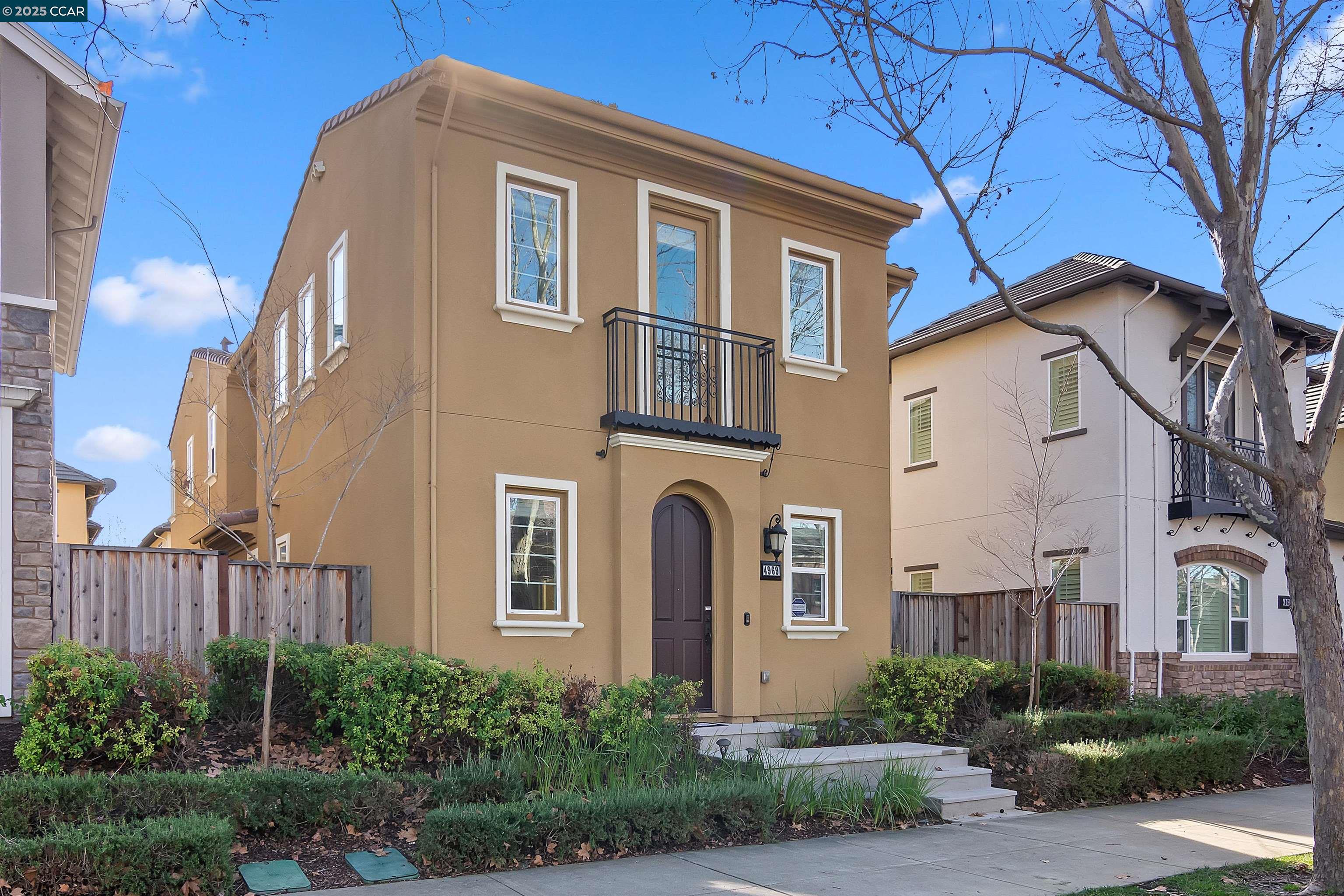 4969 Ivy Leaf Springs Road San Ramon, CA 94582 - Photo 4 of 34 a front view of a house with a yard