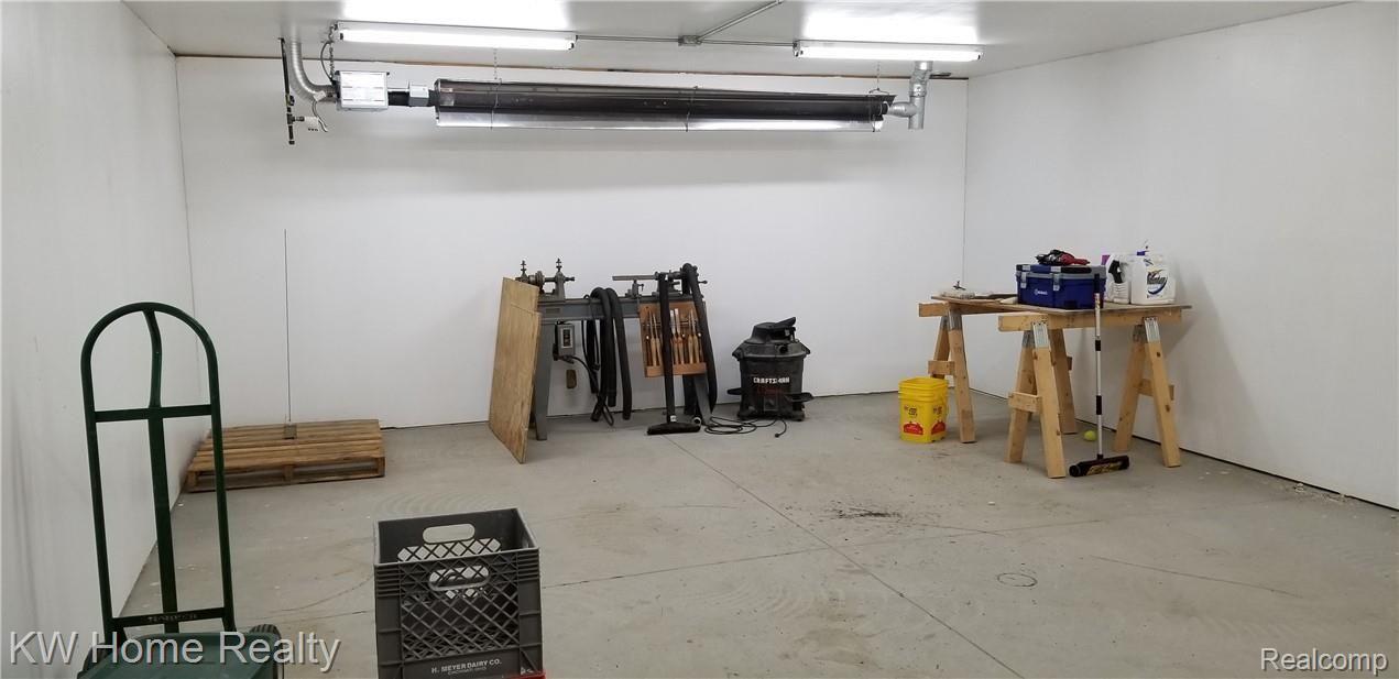 2169 Cove Road Goodells, MI 48027 - Photo 57 of 65 Interior View Of 513sq ft (27'x19') Heated Workshop
