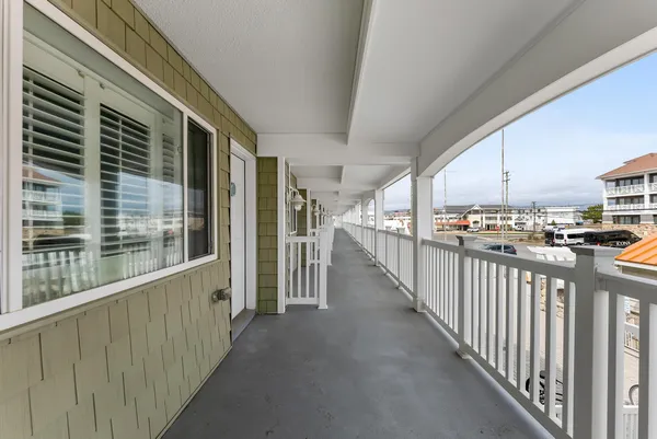 a dining room with furniture and a window