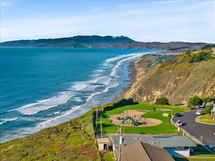 a view of an ocean from a balcony