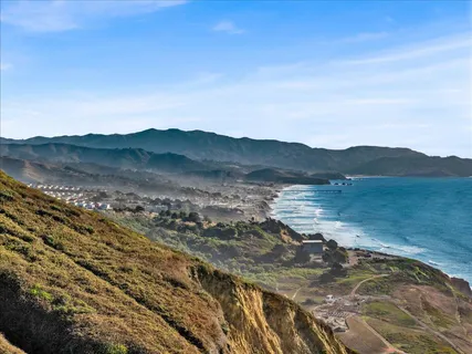 a view of lake with mountain