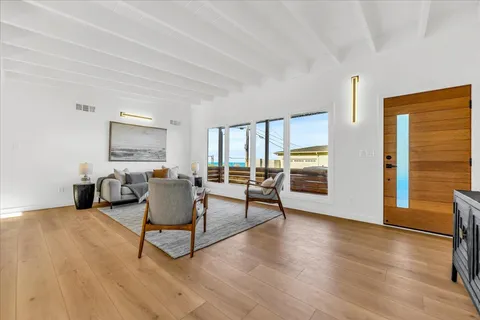 a living room with furniture and a table