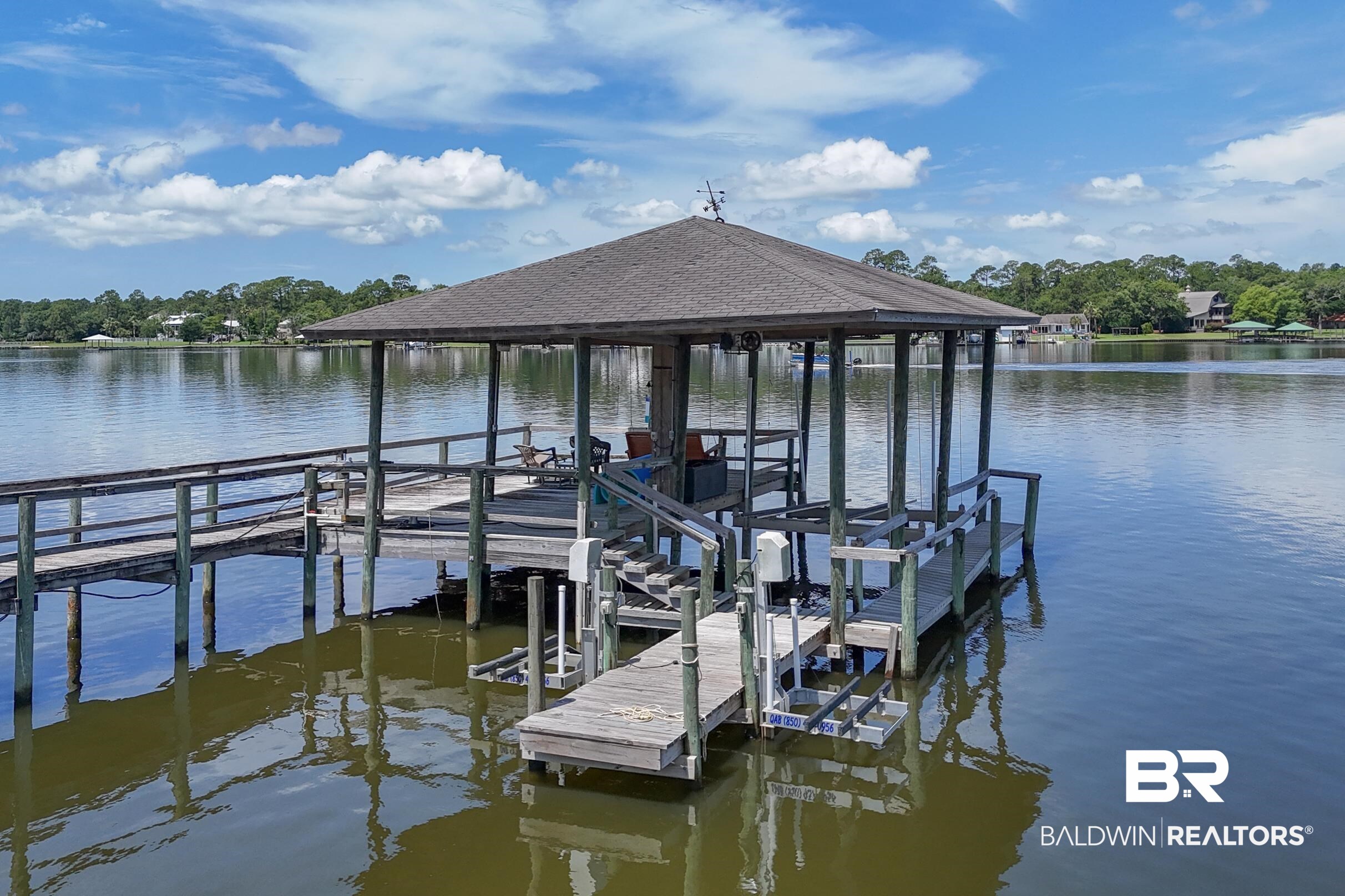 8585 Bay Harbor Road Elberta, AL 36530 - Photo 47 of 51 Dock area featuring a water view and boat lift
