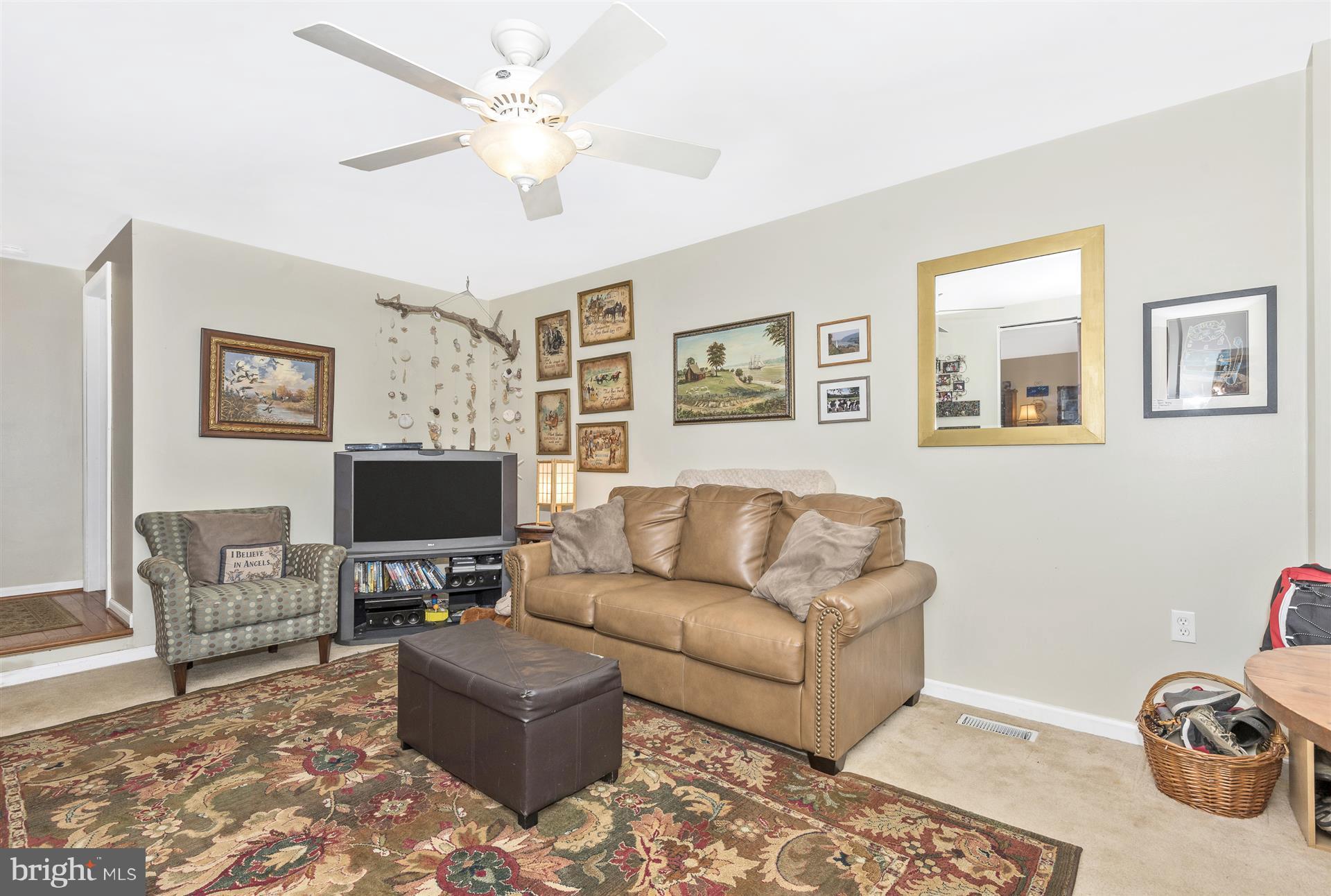1701 Brookshire Run Point of Rocks, MD 21777 - Photo 11 of 26 a living room with furniture a flat screen tv and a window