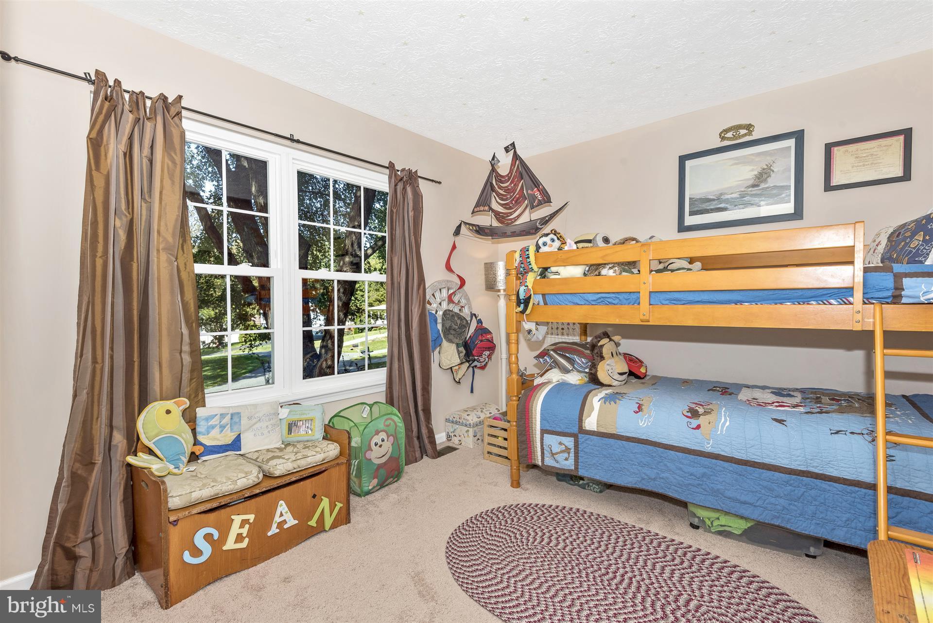 1701 Brookshire Run Point of Rocks, MD 21777 - Photo 18 of 26 a bedroom with a bed and a window