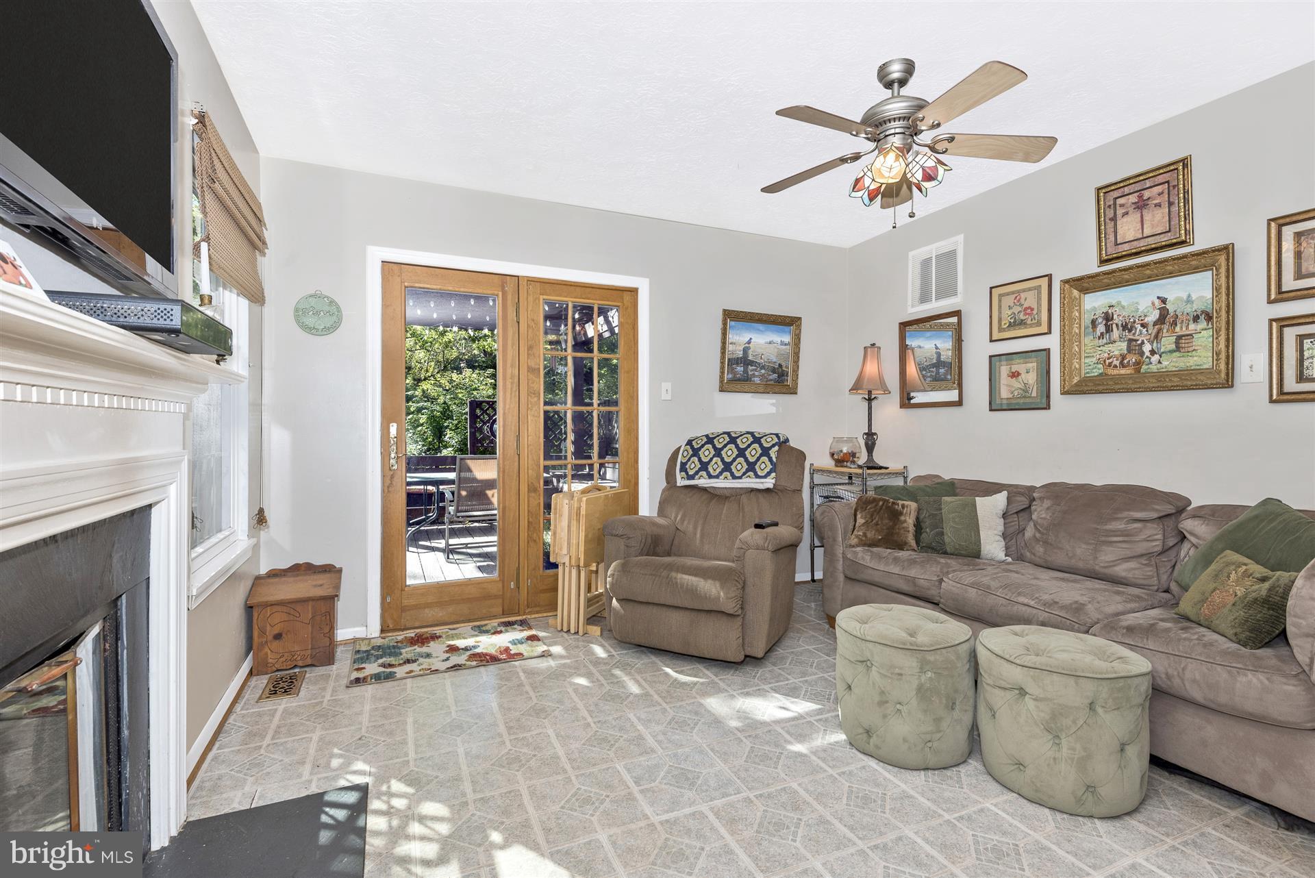 1701 Brookshire Run Point of Rocks, MD 21777 - Photo 6 of 26 a living room with furniture and a fireplace