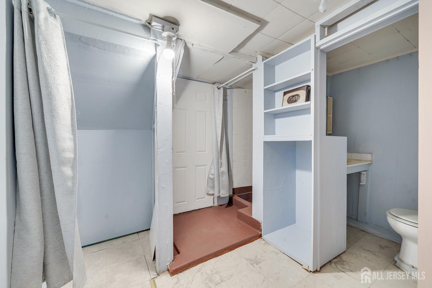 64 Commerce Street Perth Amboy, NJ 08861 - Photo 24 of 25 a view of a walk in closet