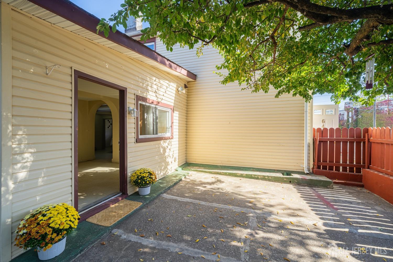 64 Commerce Street Perth Amboy, NJ 08861 - Photo 8 of 25 a view of a entryway door front of house