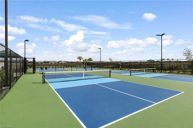 a view of an outdoor space and tennis court