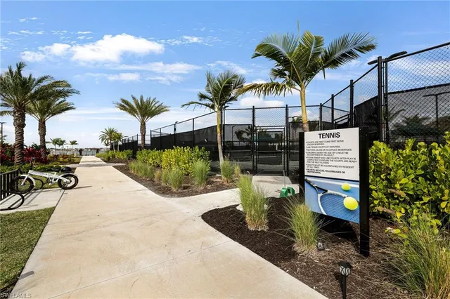 a view of a backyard patio and swimming pool