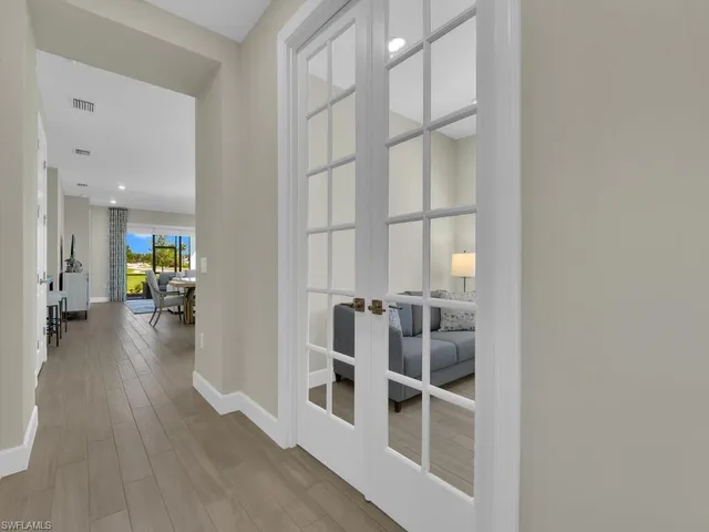 a view of a living room with furniture