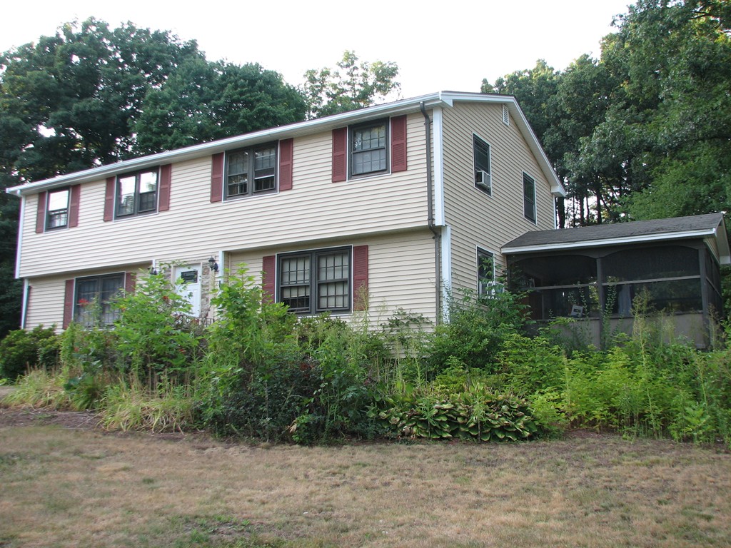 30-32 Pondover Road Billerica, MA 01821 - Photo 2 of 19 a view of a house with a yard