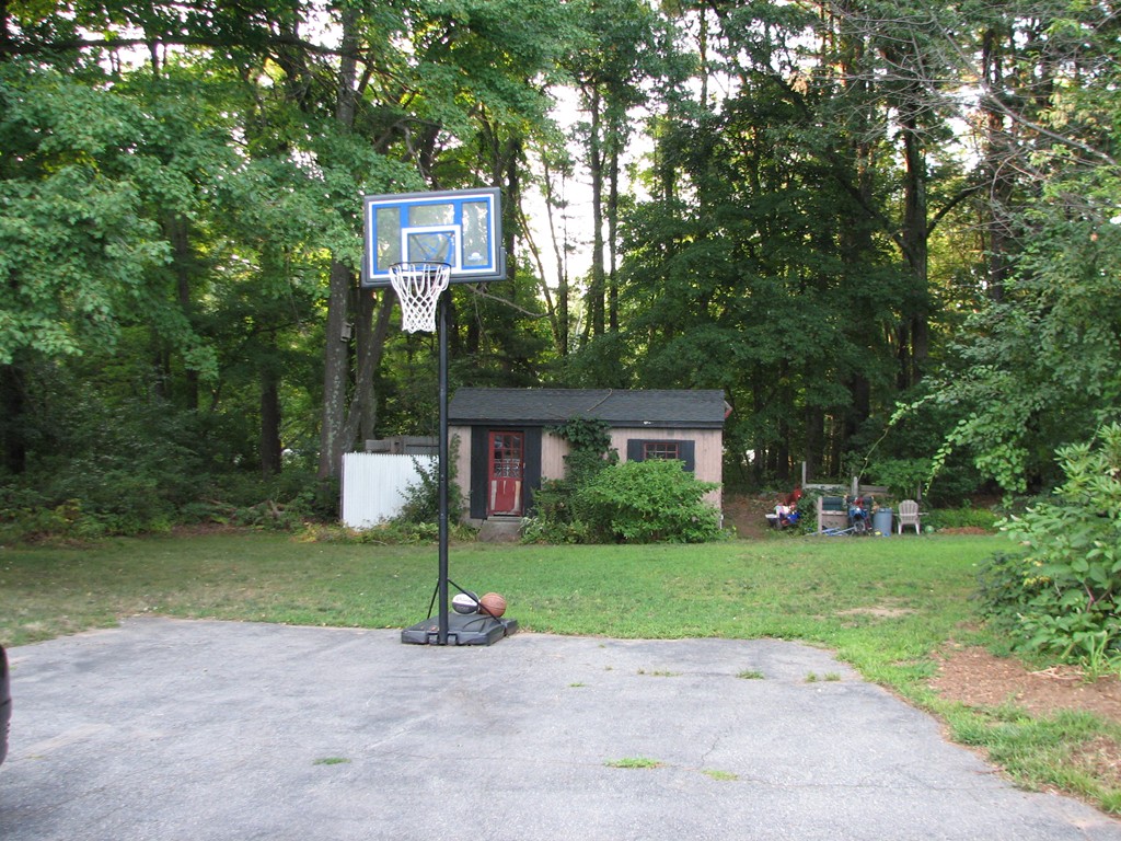 30-32 Pondover Road Billerica, MA 01821 - Photo 3 of 19 a front view of a house with a yard and garage