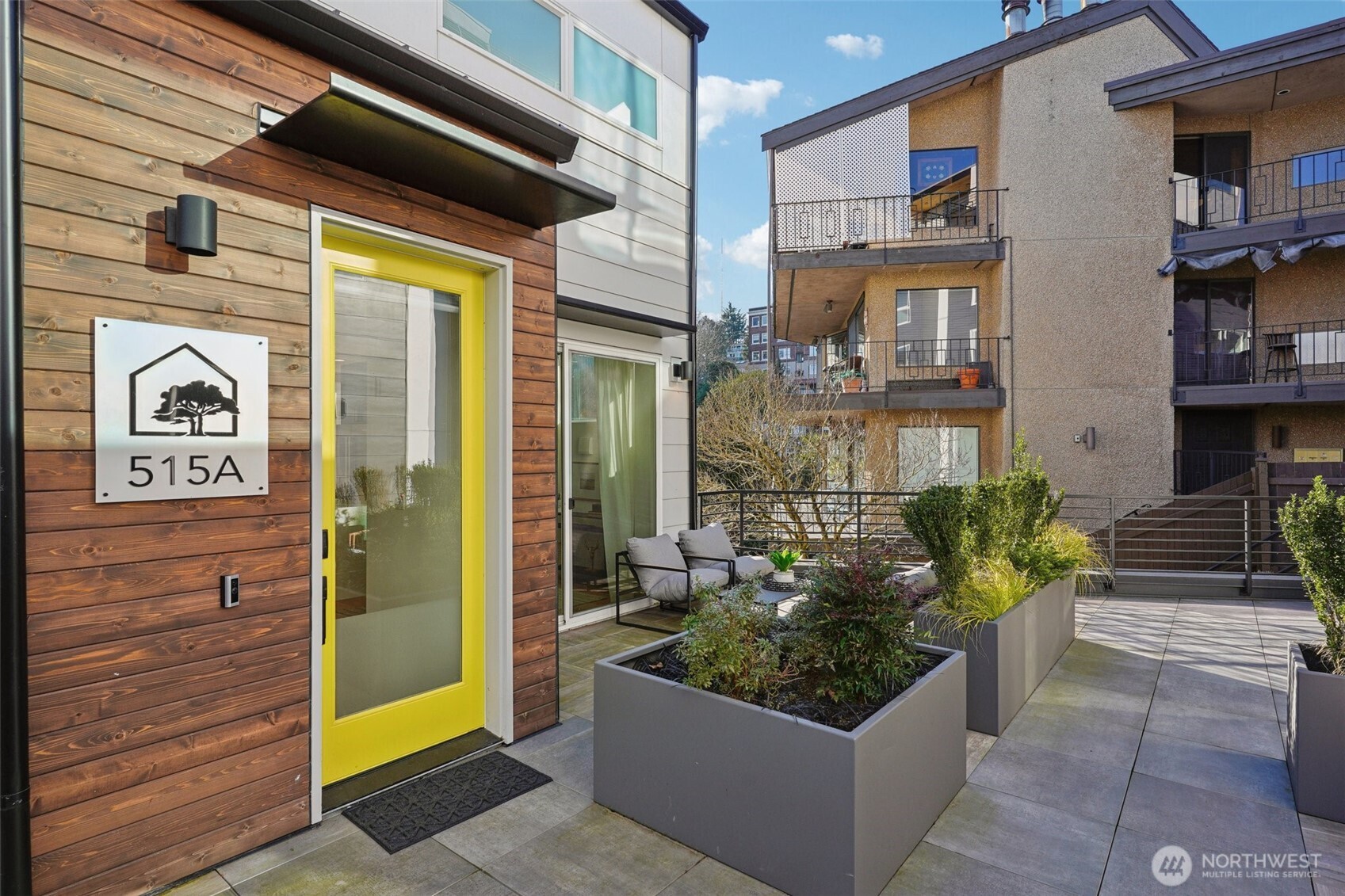 515 Howe Street, Unit A Seattle, WA 98109 - Photo 2 of 40 a view of a entrance of the building